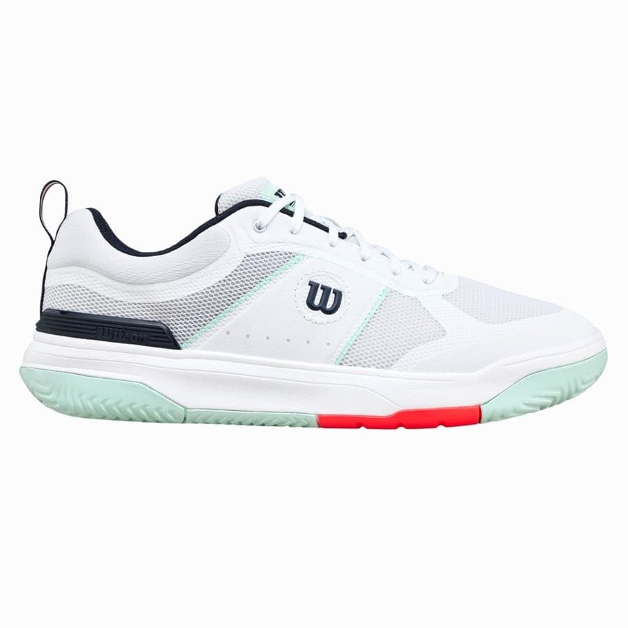 Une chaussure de pickleball blanche, vue de profil, à semelle claire